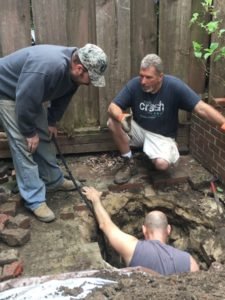 Philadelphia Outhouse dig bucket coming up