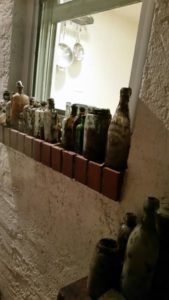 Philadelphia Outhouse dig bottles on the window sill