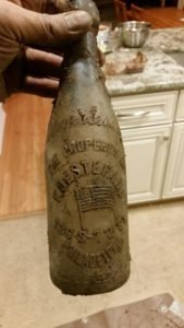 Philadelphia Outhouse Dig Flag Bottle
