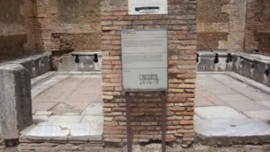 Ostia Antiqua public toilets showing keyhole